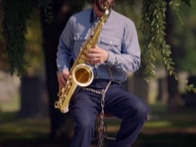 Keanu reeves playing saxophone